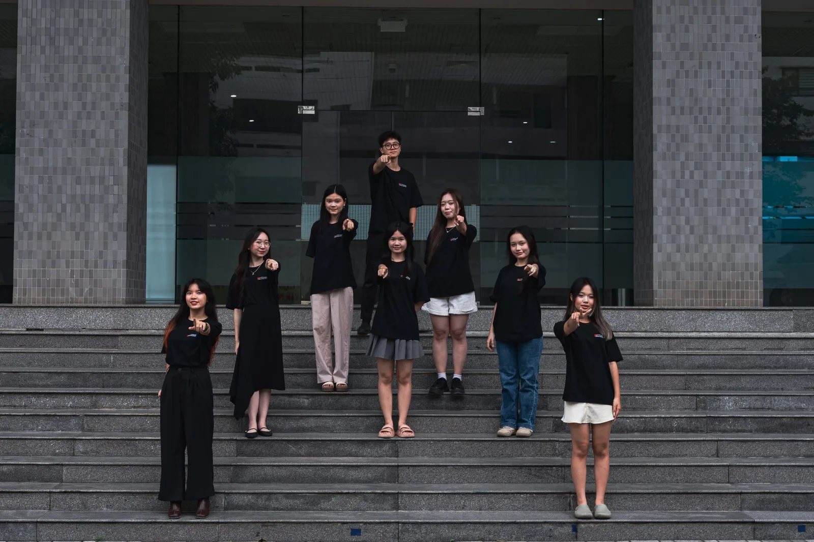The curation department, pointing at the camera